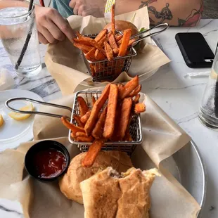Cuban with sweet potato fries, pesto aioli and goat cheese burger with sweet potato fries