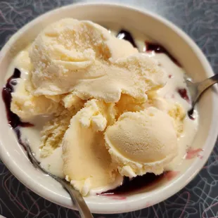 Homemade blackberry cobbler with real icecream. Amazing