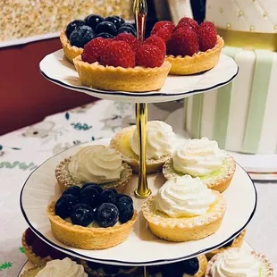 Raspberry, blueberry, key lime meringue, &amp; lemon meringue tart