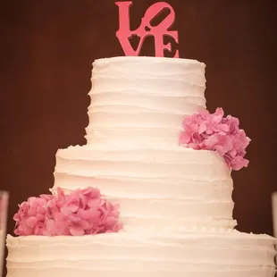 chocolate cake with strawberries and a buttercream icing