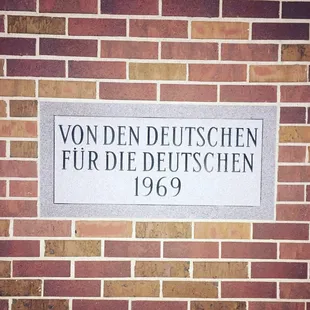 This is the cornerstone of their building and means "by Germans, for Germans".