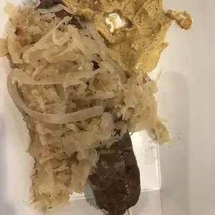 Brat on a stick for Oktoberfest. Make sure you slather that thing in Sauerkraut.