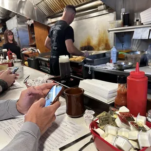 Mark in motion on the grill