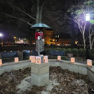 The Umbrella Girl with luminaries in Schiller Park
