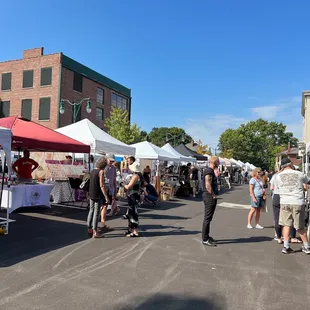 a crowd of people shopping