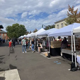 a crowd of people shopping