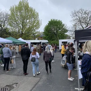 a crowd of people walking around