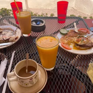 Coffee, eggs Benedict, mango smoothies