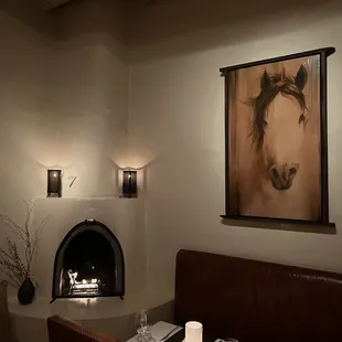 a dining room with a fireplace