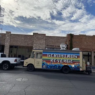 a truck parked in front of a building