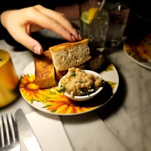 Focaccia with bean dip. Very tasty freebee.