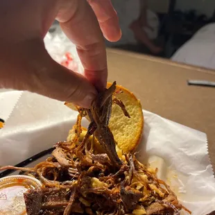 Stringy flavorless brisket.