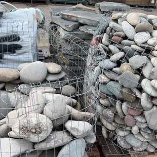 a pile of rocks in a cage