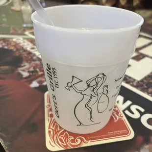 a cup with a spoon in it