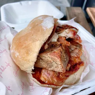 Pan Con Chicharron / onions and sauce on a the side (not shown)