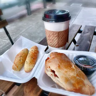 Enjoying a coffee and an empanada. Got 2 pcs of anise bread samples from the lovely owner.