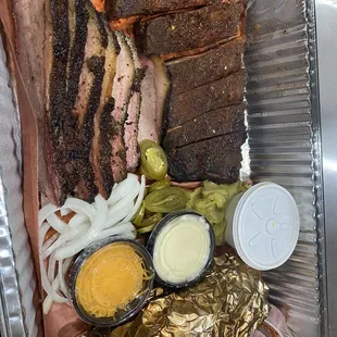 Brisket ribs and a baked potato.