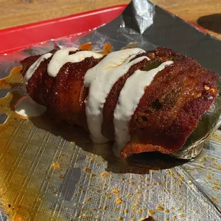 Bacon wrapped stuffed Poblano pepper