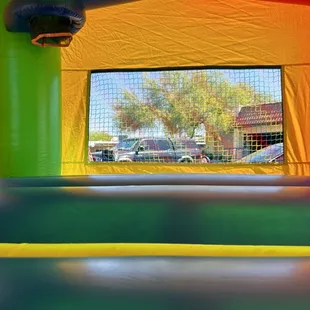 Inside our 13x13 bouncer. Has a basketball hoop