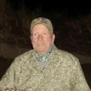 John B.