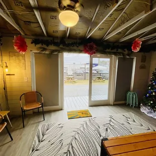 a living room with a christmas tree