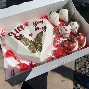 Breakable heart with dipped berries.