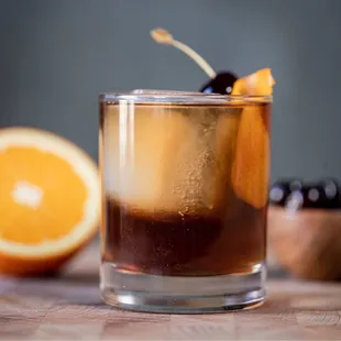 WHISKEY BUISNESS rye whiskey, sweet vermouth, bitters, orange, cherry