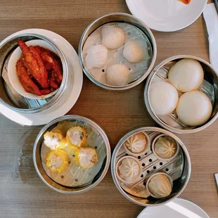 Lava custar bun, xiao long bao, siu mai, har gow, chicken feet