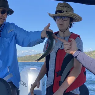 14 year old catches trout and is very unsure about it!