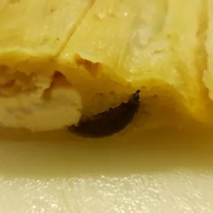 Up close with the awesome jalapeño and cream cheese tamale, nice job.