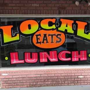 a local eats lunch sign