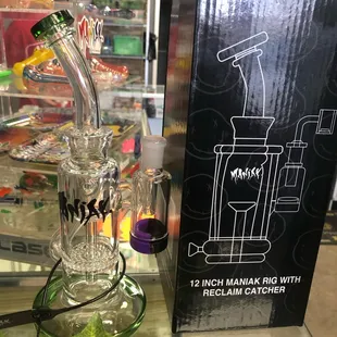 a glass water pipe and a box