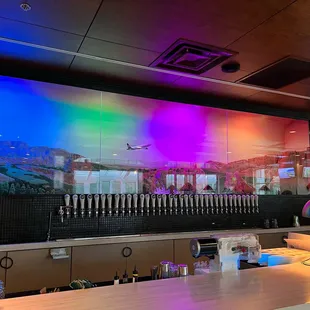 a bar with colorful lights