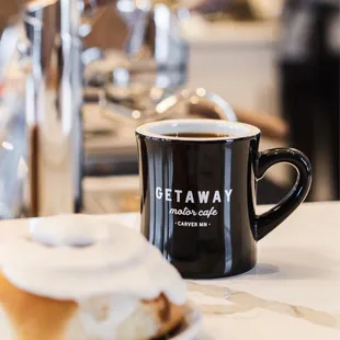 Cinnamon roll and delicious coffee.