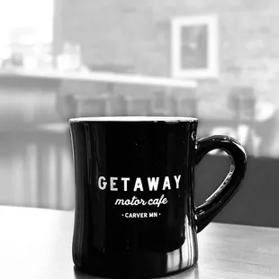 a coffee cup on a table