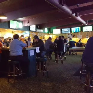 people sitting at the bar