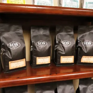 a shelf of coffee beans