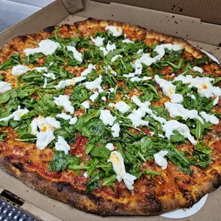 Special: Arugula tossed with olive oil, lemon juice, salt, and pepper then topped with stracciatella, and hot crispy oil