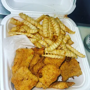 Catfish nuggets with fries hushpuppies