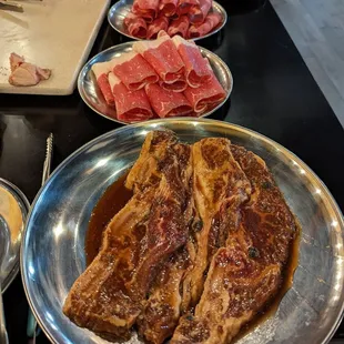 a variety of meats on a table