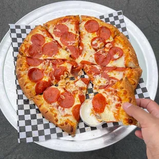 a slice of pepperoni pizza