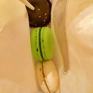 three macarons and a spoon
