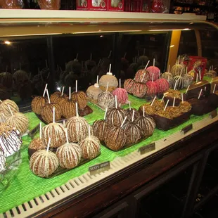 a display of caramel apples