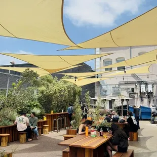 Outdoor patio in the back, food gets delivered.