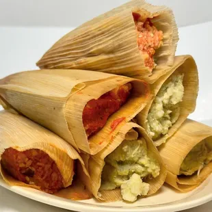 Puebla style tamales - Green with chicken, Red with rajas and cheese.