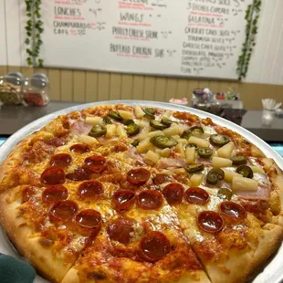 14" (large) pizza half pepperoni and half Hawaiian with jalapeno.