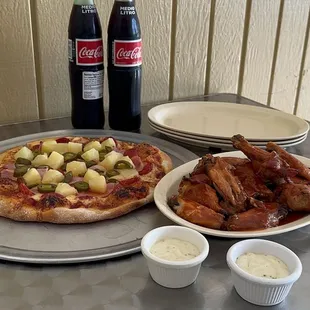 10" pizza , oven baked buffalo wings.