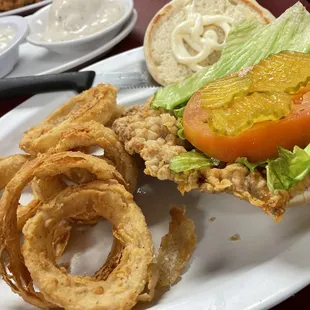 Hand breaded steak sandwich and onion rings