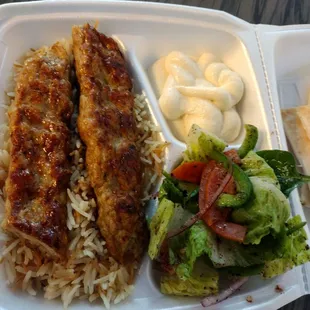 chicken lula with salad, hummus, bread