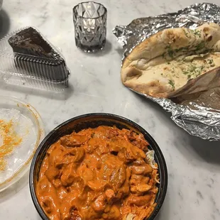 The BUTTER CHICKEN BOWL and Garlic Naan are always my go to favs